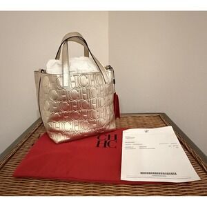 Authentic NWT gold monogram leather Carolina Herrera Matryoshka M medium handbag